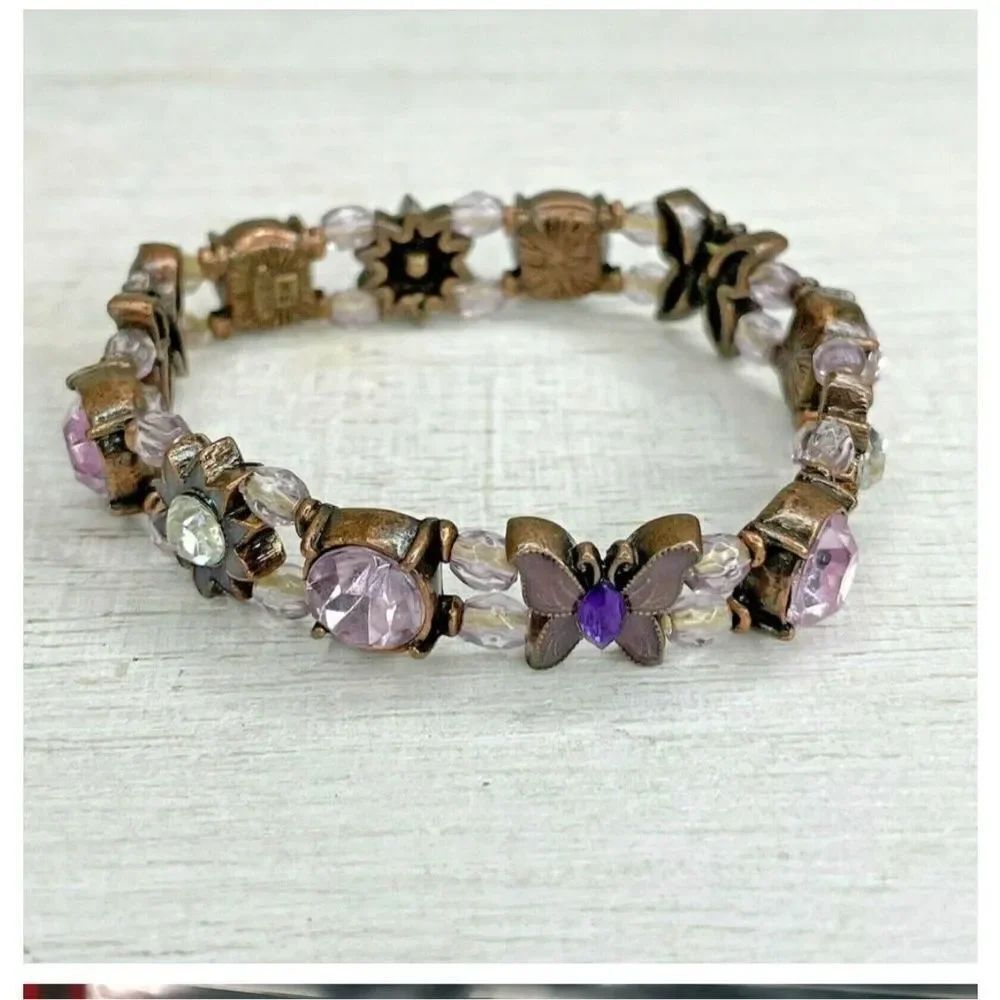 Avon copper tone purple butterfly stretchy bracelet